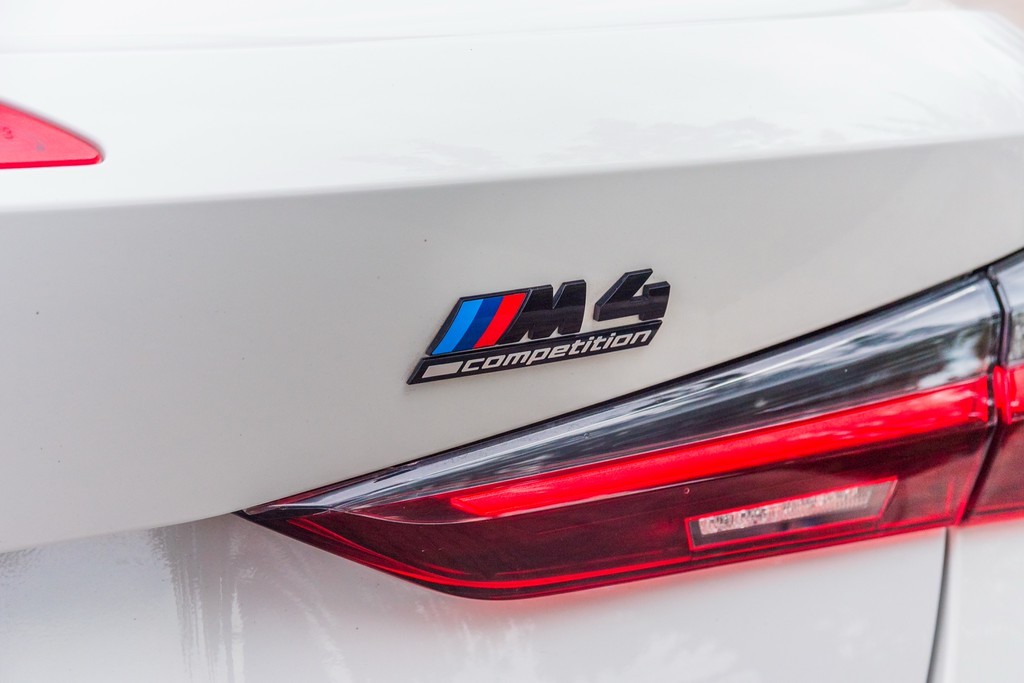 BMW M4 Competition Convertible — photo 2 of 15, White exterior with Orange interior, available from KEY'D Miami